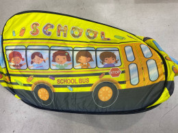 portable kids' play tent shaped like a school bus. portable kids' play tent shaped like a school bus.