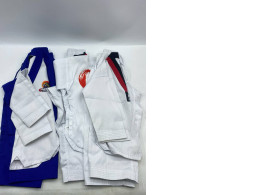 Set of 5 White and blue taekwondo uniform.