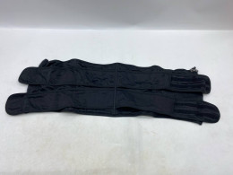 At the black block in the back.