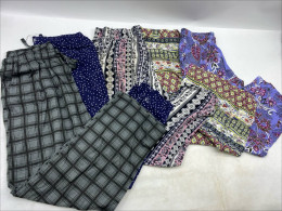 Set of 5 Women's patterned trousers. Set of 5 Women's patterned trousers.