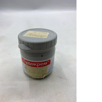  small tub of Sudocrem, an antiseptic healing cream primarily used for treating and preventing diaper rash. 