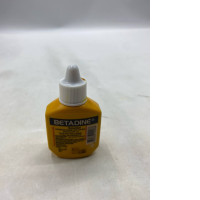 bottle of Betadine Povidone-Iodine Solution, a first aid antiseptic. 