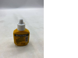 bottle of Betadine Povidone-Iodine Solution, a first aid antiseptic. 