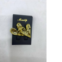 Gold heart-shaped earrings for women.