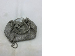  Jimmy Choo Bon Bon silver satin crystal mesh bag with a crystal handle. 