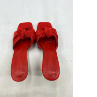 Red high-heeled shoes for women