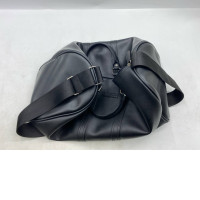 Tumi Alpha 3 Double Expansion Travel Satchel in black leather. 