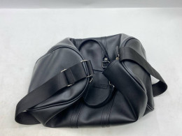 Tumi Alpha 3 Double Expansion Travel Satchel in black leather. 