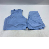 set of 2 A two-piece blue sportswear set consisting of a high-neck crop top and skirt-shorts.
