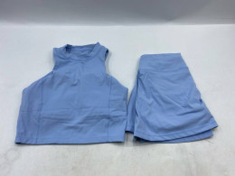 set of 2 A two-piece blue sportswear set consisting of a high-neck crop top and skirt-shorts.