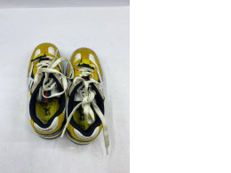 Aimé Leon Dore x New Balance 827 Abzorb sneakers in yellow and white.