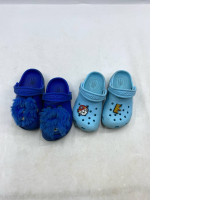 Set of 2  blue Crocs Toddlers' Classic I AM Monster Clogs and light blue Crocs Paw Patrol Off Court Clogs. 