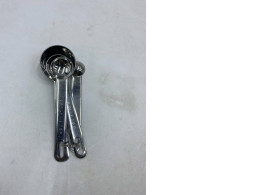  stainless steel measuring spoons. 