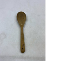 wooden cooking spoon, also known as a wooden ladle or spatula. 