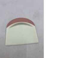 Dough scrapers or curved bowls are usually made of silicone or plastic.