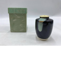 A Japanese shiitake is an earthenware vessel used in the Japanese tea ceremony.