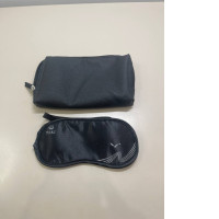 Empty travel cosmetic bag with sleep mask Empty travel cosmetic bag with sleep mask