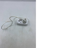 A white extension cord or power splitter with two Type F (Schuko) sockets. A white extension cord or power splitter with two Type F (Schuko) sockets.