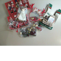 A set of Christmas tree decorations, a train, an angel, bells, Nutcracker soldiers, and reindeer antlers