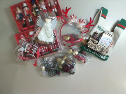 A set of Christmas tree decorations, a train, an angel, bells, Nutcracker soldiers, and reindeer antlers