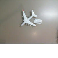 Metal airplane with stand