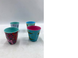Set of 4 Plastic drinking cups with Christmas designs. Set of 4 Plastic drinking cups with Christmas designs.