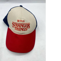 Adjustable trucker cap in red, white, and blue, featuring a Stranger Things design from Netflix.