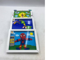 Set of 3  clay sculpting tools, or a decorative shadow box featuring various cartoon characters.