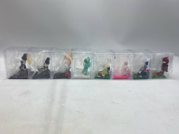 Set of 8 figures from the Yujin Disney Characters Figure Collection, likely part of a specific series Set of 8 figures from the Yujin Disney Characters Figure Collection, likely part of a specific series