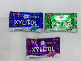 Set of 3 Lotte Xylitol Sugar-Free Chewing Gum. Flavors: Fresh Mint (Blue), Lemon Mint (Green), and Blueberry Mint (Purple).