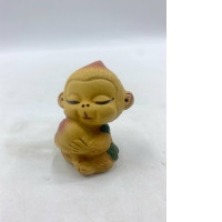 Small terracotta monkey figurines for collectors.