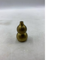 A brass gourd, which is a lucky charm.