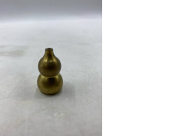 A brass gourd, which is a lucky charm. A brass gourd, which is a lucky charm.