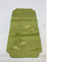 Olive green coaster/placemat with cloud and crane pattern. Olive green coaster/placemat with cloud and crane pattern.