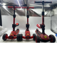 Set of 3 Ferrari 2-in-1 foldable twist scooters for kids, which can be used as both a ride-on with a seat and a stand-up scooter. 