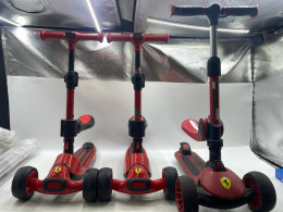 Set of 3 Ferrari 2-in-1 foldable twist scooters for kids, which can be used as both a ride-on with a seat and a stand-up scooter. 