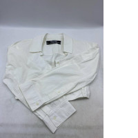 White cropped long-sleeved shirt.