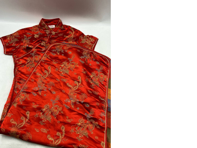 Red cheongsam dress with gold dragon pattern Red cheongsam dress with gold dragon pattern