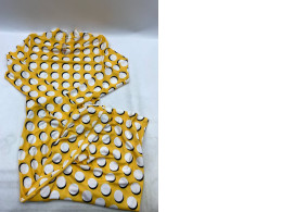 Long-sleeved yellow polka dot dress