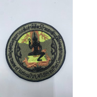 National Park badge worn on the chest.