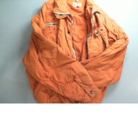 Orange jacket with zipped pockets