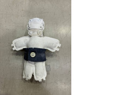 a plush toy depicting a little man