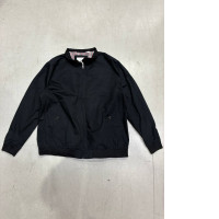 Ben Sherman's signature black Harrington jacket.