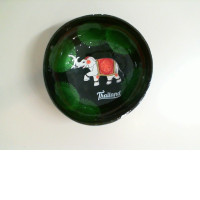 Souvenir coconut plate with an elephant design