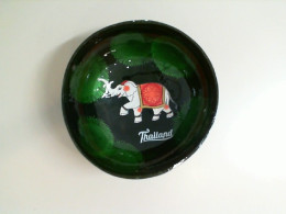 Souvenir coconut plate with an elephant design