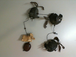 Wind chime made of coconuts in the shape of an elephant Wind chime made of coconuts in the shape of an elephant