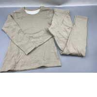 Beige merino wool innerwear top and bottoms. Beige merino wool innerwear top and bottoms.