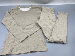 Beige merino wool innerwear top and bottoms. Beige merino wool innerwear top and bottoms.