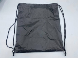  black nylon drawstring bag. 
