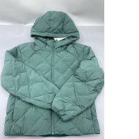 UNIQLO Puff Tech Parka in a light green color. 